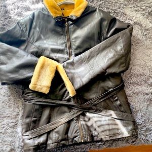 100% Genuine leather coat still in good shape